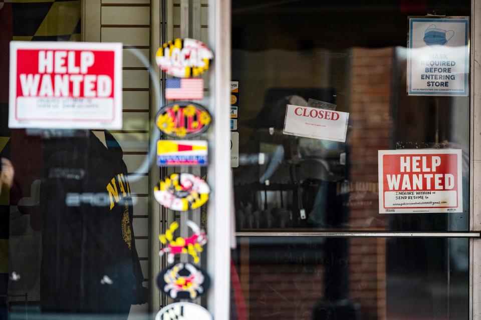 A store advertises a Help Wanted sign in Annapolis, Maryland, on May 12, 2021. - US consumer inflation surged 4.2 percent last month compared to April 2020, the Labor Department said May 12, 2021, posting the biggest year-on-year increase since 2008 as the economy recovered from the pandemic. (Photo by JIM WATSON / AFP) (Photo by JIM WATSON/AFP via Getty Images)