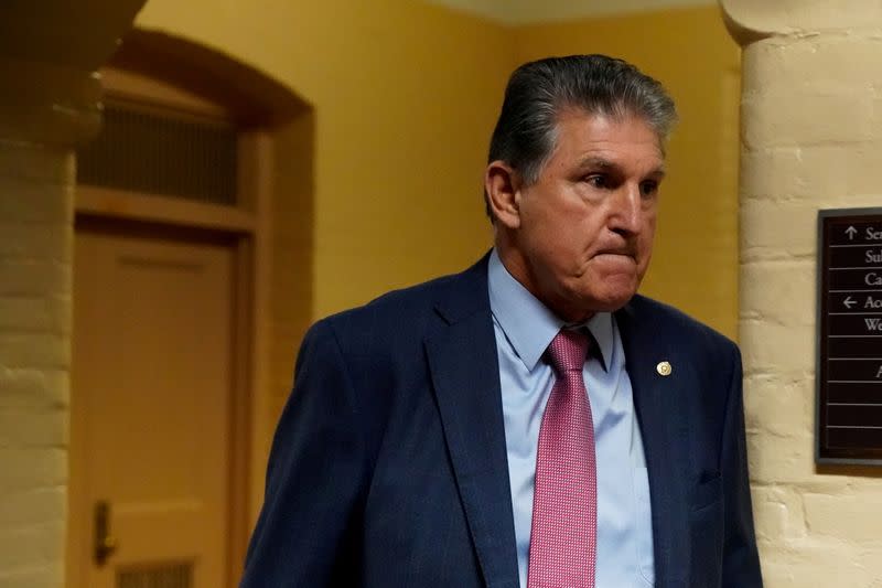 U.S. Senator Joe Manchin (D-WV) walks through the U.S. Capitol in Washington