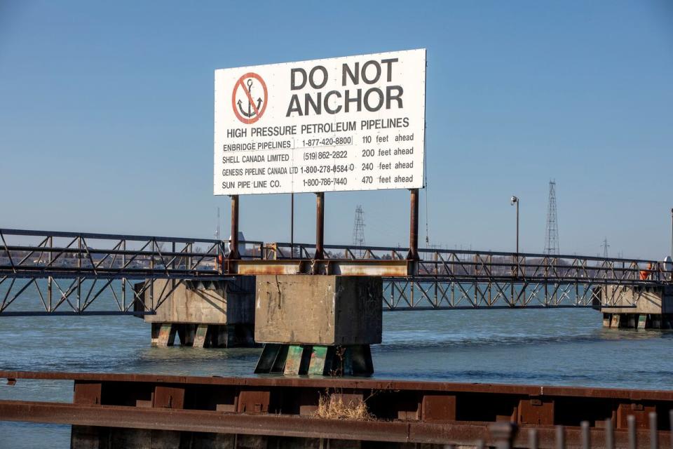 A signpost marks the presence of high pressure petroleum pipelines including Enbridge's Line 5 pipeline, which Michigan Governor Gretchen Whitmer ordered shut down in May 2021, in Sarnia, Ontario, Canada March 20, 2021. Picture taken March 20, 2021. 