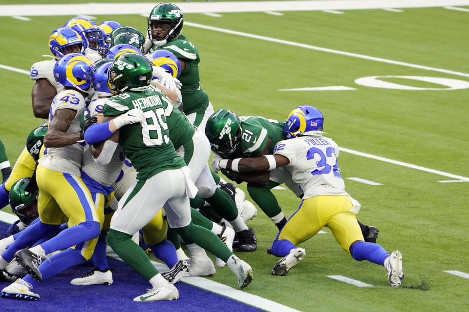 New York Jets running back Frank Gore (21) runs into the end zone for a touchdown against the Los Angeles Rams during the second half of an NFL football game Sunday, Dec. 20, 2020, in Inglewood, Calif. (AP Photo/Jae C. Hong)