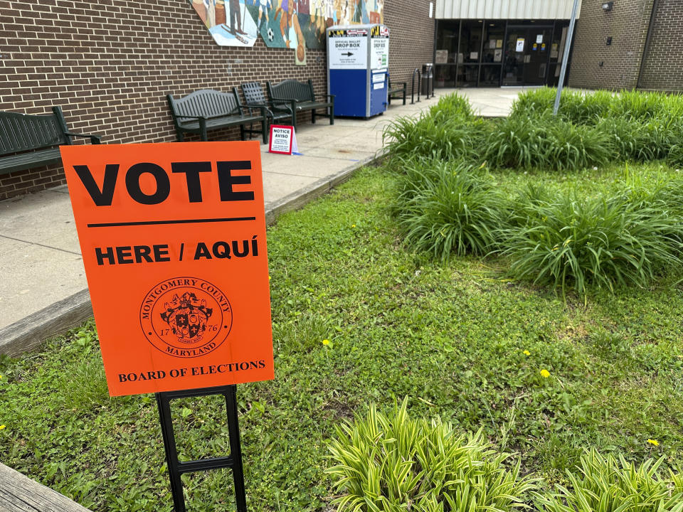 Signs are pictured outside an early voting center on Thursday, May 9, 2024, in Rockville, Md. President Joe Biden and former President Donald Trump look to pad their delegate totals in Maryland Tuesday, May 14. Maryland voters will also decide contested primaries in a Senate race that has further complicated Democratic efforts to keep control of the narrowly divided chamber this fall. (AP Photo/Robert Yoon)