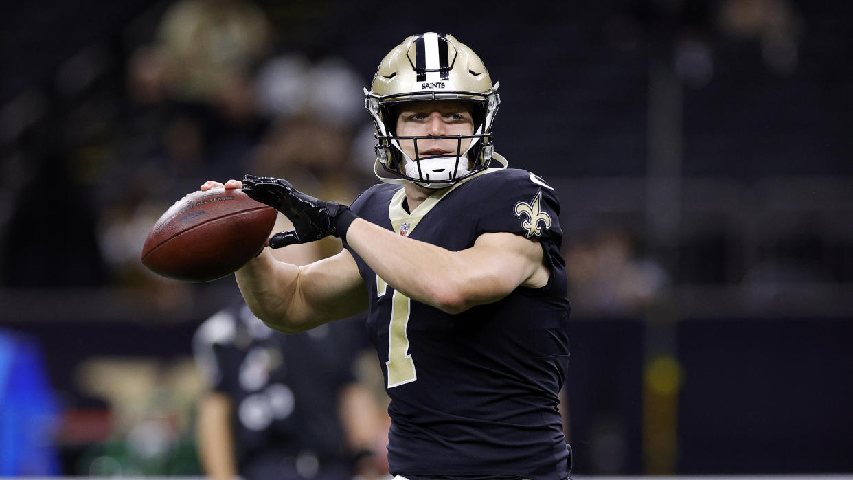 New Orleans Saints quarterback Taysom Hill (7) warms up before an NFL football game against the New York Giants, Sunday, Oct. 3, 2021, in New Orleans. (AP Photo/Tyler Kaufman)