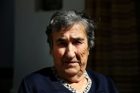 Emilia Kamvisi, 86, a Nobel Peace Prize nominee, poses for a picture at her house at the Skala Sikamias village on the island of Lesbos, Greece, October 5, 2016. REUTERS/Alkis Konstantinidis