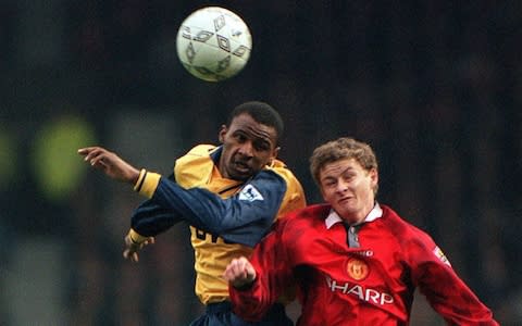 Arsenal's Patrick Vieira beats Man Utd's Solskjaer in the air - Credit: Action Images