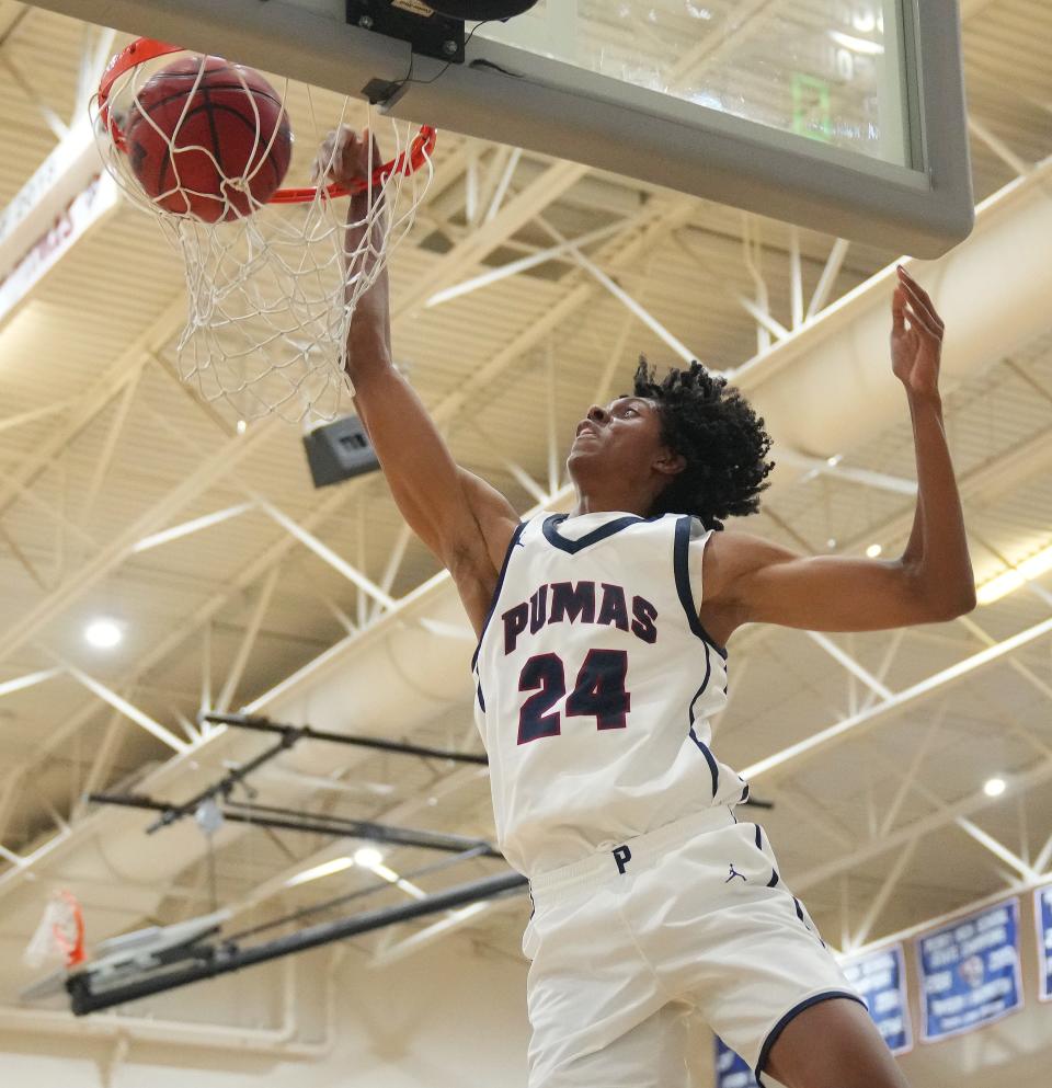 Dec 14, 2021; Gilbert, AZ, United States; Perry's Cody Williams (24) dunks against Mountain Pointe during a game at Perry High School.