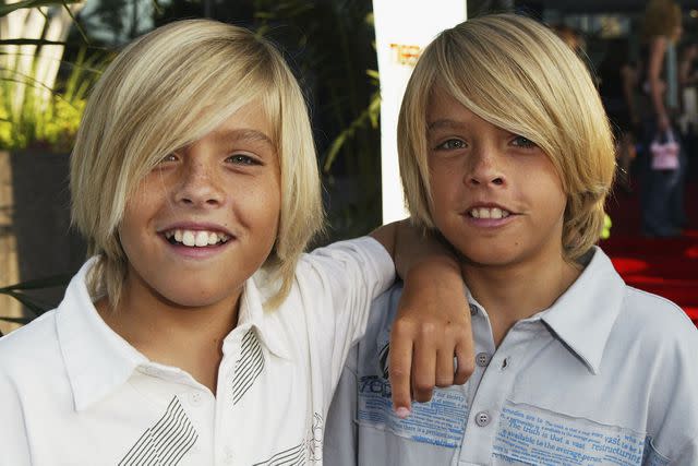 <p>Frazer Harrison/Getty </p> Dylan and Cole Sprouse in 2004