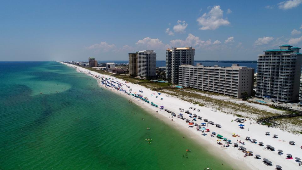View a sunny day on Navarre Beach on Aug. 4, 2020