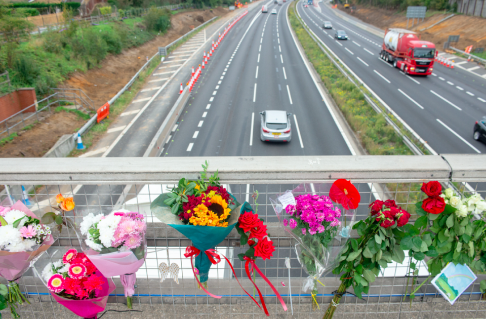 Floral tributes were left at the bridge following the suicide (SWNS)