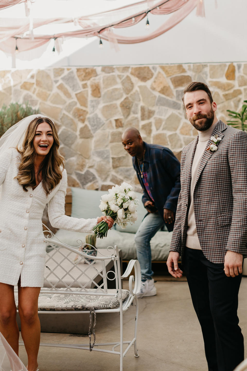 Dave Chapelle surprised Eleanor and Matt before their wedding in the outdoor patio area at the Line Hotel in Austin, Texas. (Anna Szczekutowicz)