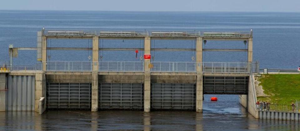 Water pours out of Lake Okeechobee from the Port Mayaca dam, August 6, 2013.