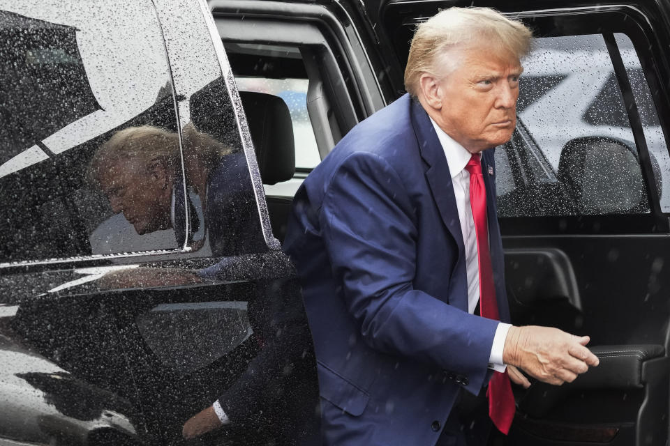 FILE - Former President Donald Trump arrives to board his plane at Ronald Reagan Washington National Airport, Aug. 3, 2023, in Arlington, Va., after facing a judge on federal conspiracy charges that allege he conspired to subvert the 2020 election. Trump and his legal team face long odds in their bid to move his 2020 election conspiracy trial out of Washington. They argue the Republican former president can’t possibly get a fair trial in the overwhelmingly Democratic nation’s capital. (AP Photo/Alex Brandon, File)