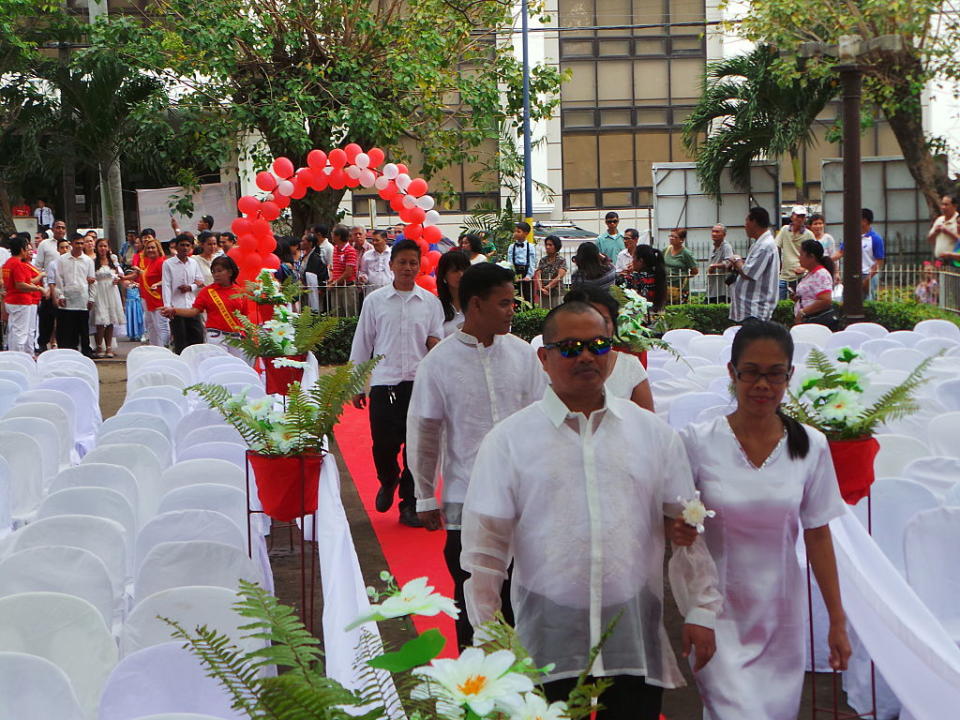 172 unwed couples attend the free civil union in Iloilo City on Valentine's Day at the historic Plaza Libertad. Mayor Jed Patrick Mabilog, who started the free mass wedding in Iloilo City since 2012, officiated the legal union of the couples.