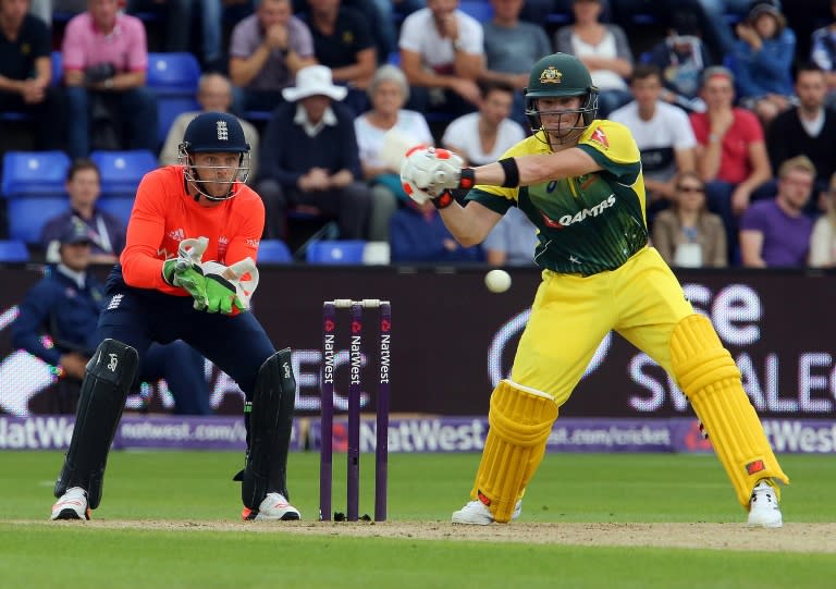 Australia's Steven Smith prepares to play a shot watched by England's Jos Buttler during the Twenty20 International match in Cardiff on August 31, 2015