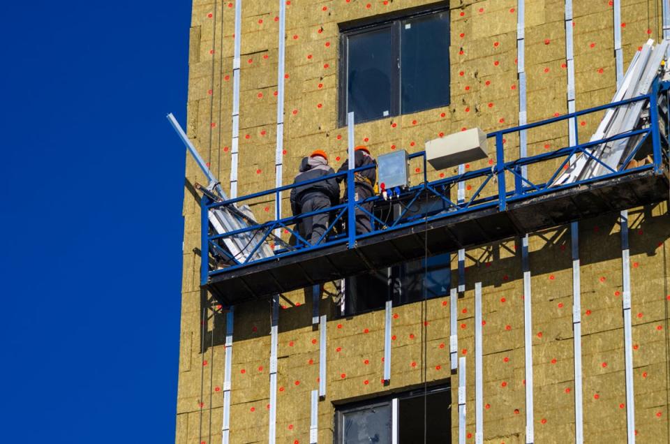 Avoid properties with cladding issues and get a thorough survey before exchanging contracts (Shutterstock / Artem Yampolcev)