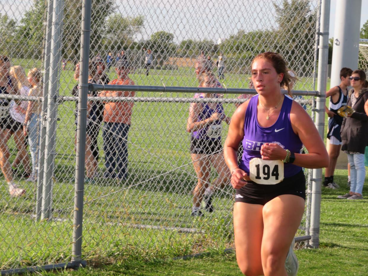 Burlington High School senior Ella Schroeder competes in her final Tim Proctor Cross Country Invitational Thursday at the Burlington Regional Rec Plex.