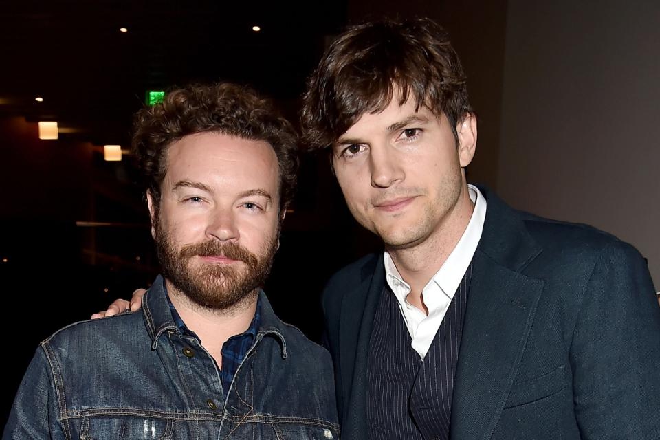 Actors Danny Masterson (L) and Ashton Kutcher (R) backstage during the 2017 CMT Music Awards at the Music City Center on June 7, 2017 in Nashville, Tennessee.