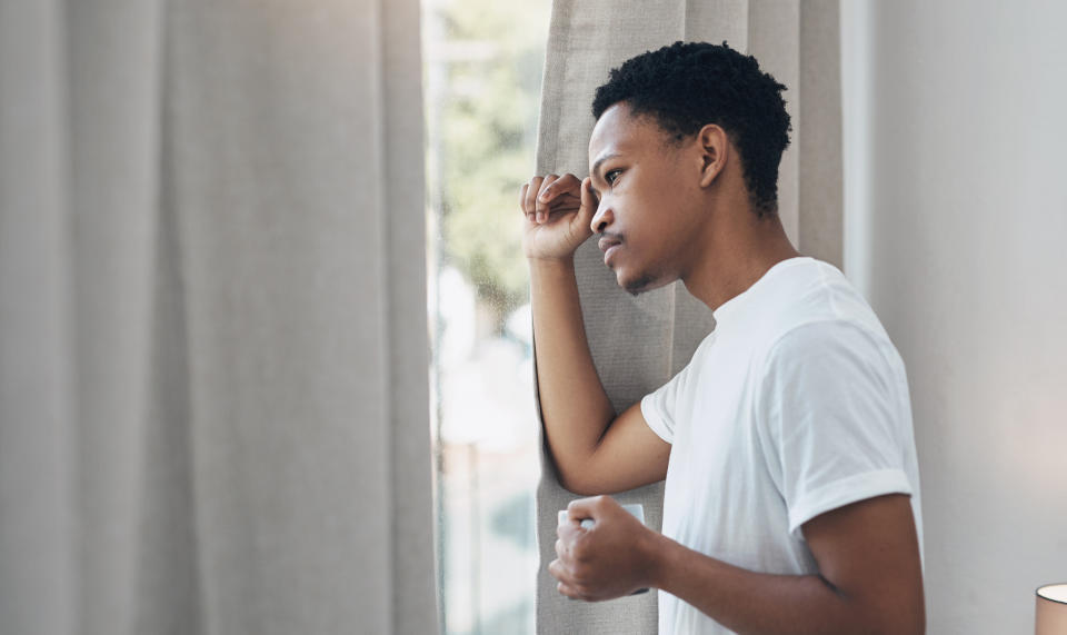 At the farthest end of the spectrum, a person could experience agoraphobia or PTSD-like reactions, such as hypervigilance and increased physical reactivity, after being in lockdown for so many months. (Photo: PeopleImages via Getty Images)