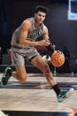 In this photo provided by Overtime Elite, Dominick Barlow plays basketball at OTE Arena in Atlanta, Saturday, Feb. 26, 2022. Barlow will be one of the 76 prospects at the NBA draft combine this week in Chicago. But he didn’t take the conventional route through the college ranks. Or the NBA’s G League Ignite. Or playing overseas. He turned down college offers to receive on-the-job training through Overtime Elite, a new basketball league created to give high school players another path to the pros. He got paid -- a six-figure salary -- as he learned about nutrition, social-media skills, financial literacy and, of course, the art of basketball. (Kyle Hess/Overtime Elite via AP)