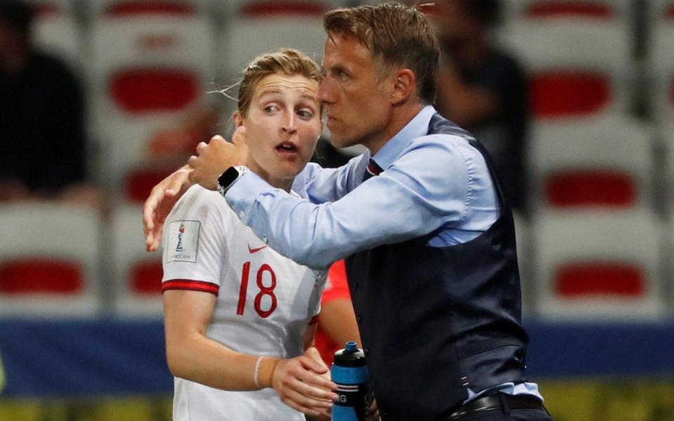 England's Ellen White celebrates scoring their second goal with England manager Phil Neville - REUTERS
