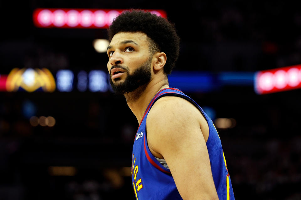 Jamal Murray #27 of the Denver Nuggets looks on against the Minnesota Timberwolves in the first quarter of Game Three of the Western Conference Second Round Playoffs at Target Center on May 10, 2024 in Minneapolis, Minnesota. The Nuggets defeated the Timberwolves 117-90. (Photo by David Berding/Getty Images)