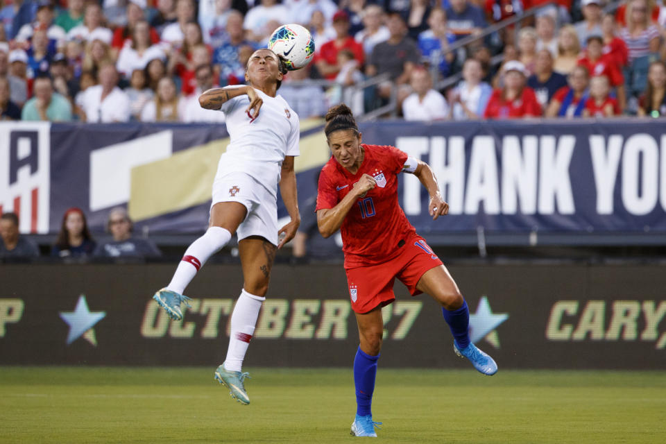 Portugal's Ana Borges, left, and United States' Carli Lloyd vie for a head ball during the first half of an international friendly soccer match Thursday, Aug. 29, 2019, in Philadelphia. (AP Photo/Matt Slocum)