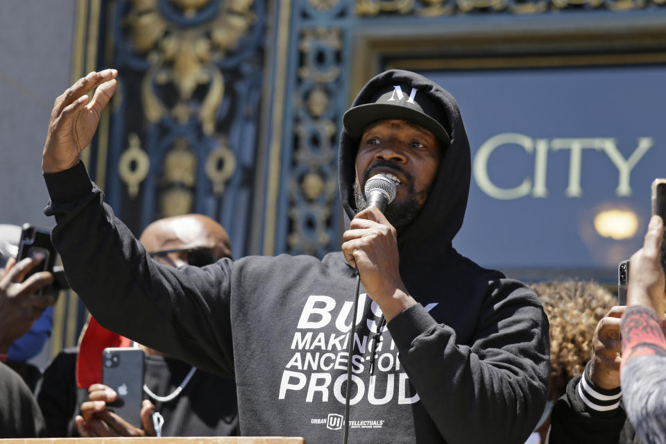Jamie Foxx speaks to a large crowd during a "kneel-in" to protest police racism on the steps of City Hall Monday, June 1, 2020, in San Francisco. (AP Photo/Eric Risberg)