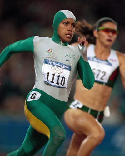 <p>Cathy Freeman takes the lead during the 400m final at the 2000 Olympics.</p>