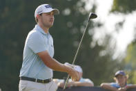 Patrick Cantlay watches his shot on the 16th tee during the second round of the BMW Championship golf tournament at Wilmington Country Club, Friday, Aug. 19, 2022, in Wilmington, Del. (AP Photo/Julio Cortez)