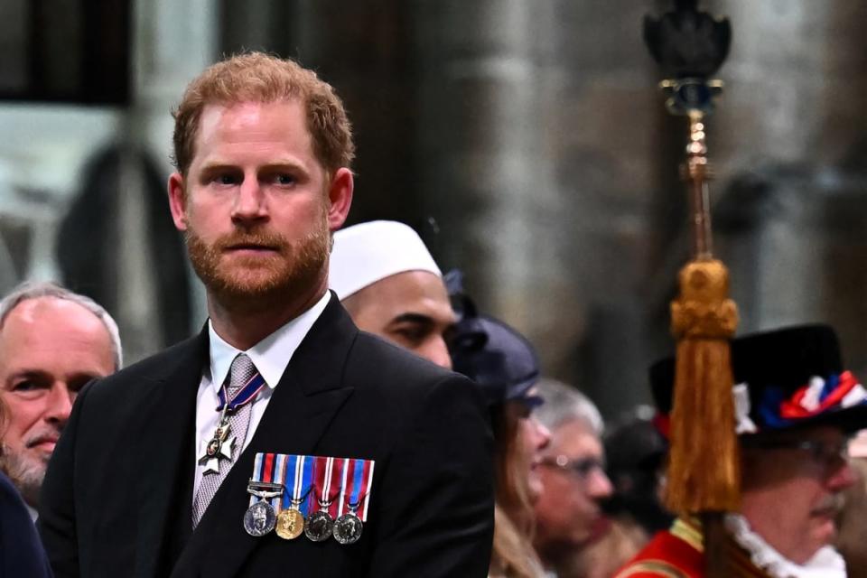 <div class="inline-image__caption"><p>Britain's Prince Harry, Duke of Sussex looks on as Britain's King Charles III leaves Westminster Abbey after the Coronation Ceremonies in central London on May 6, 2023.</p></div> <div class="inline-image__credit">BEN STANSALL/Pool via REUTERS</div>