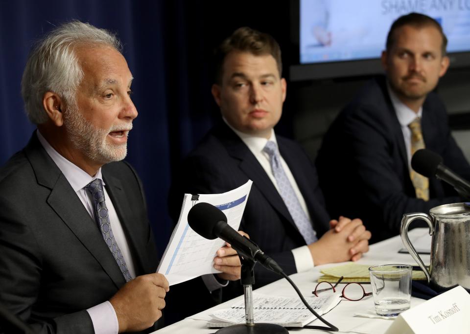 Attorney Tim Kosnoff, left, speaks during a press conference held by the Abused in Scouting legal team on Aug. 6, 2019, in Washington, D.C.