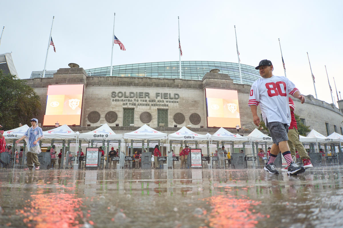 Chicago Bears Celebrate Win By Sliding Through the Lake in the Soldier Field  End Zone