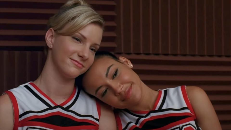 Santana leaning her head on Britney's shoulder in Glee.