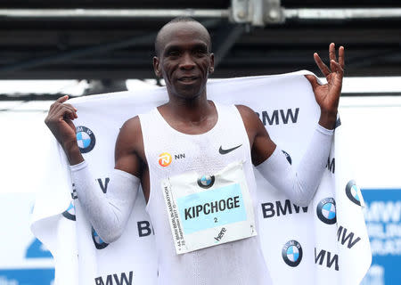 Athletics - Berlin Marathon - Berlin, Germany - September 24, 2017 Kenya's Eliud Kipchoge celebrates after winning the race REUTERS/Michael Dalder