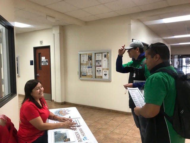 Activist Irma Cruz, left, talks to students at Western Technical College in El Paso, Texas, in the fall of 2019. Cruz is trying to get residents of the city to fill out the 2020 census. Many experts warn that a severe undercount due to sped up timelines is likely to greatly affect communities of color.