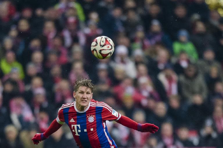 Bayern Munich's midfielder Bastian Schweinsteiger plays the ball during the German first division Bundesliga football match FC Bayern Muenchen vs 1 FC Koeln in Munich, Germany, on February 27, 2015