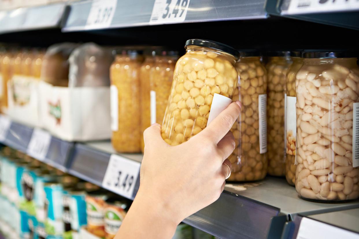 Chickpea can in hand at store