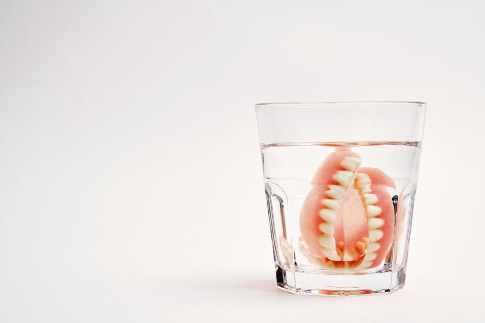 Dentures in a glass of water