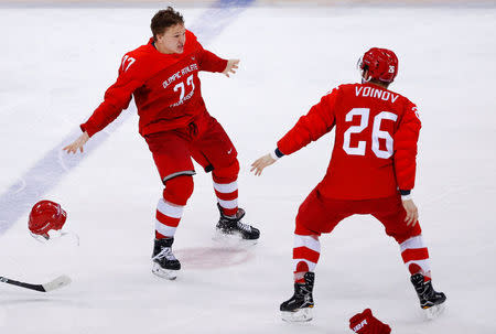 Ice Hockey - Pyeongchang 2018 Winter Olympics - Men's Final Game - Olympic Athletes from Russia v Germany - Gangneung Hockey Centre, Gangneung, South Korea - February 25, 2018 - Kirill Kaprizov, an Olympic Athlete from Russia, celebrates scoring a goal with team mate Vyacheslav Voinov. REUTERS/Brian Snyder TPX IMAGES OF THE DAY