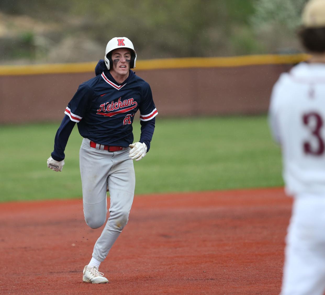 Roy C. Ketcham's Riley Weatherwax runs to third base during a game versus Arlington on April 17, 2024.