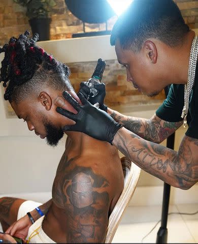 <p>Damar Hamlin/instagram</p> Damar Hamlin is seen getting tatted