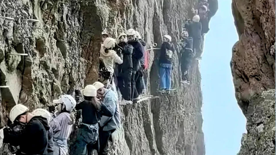 Climbers on Wandang Mountain in China. <p>Xiaohongshu/CNN</p>