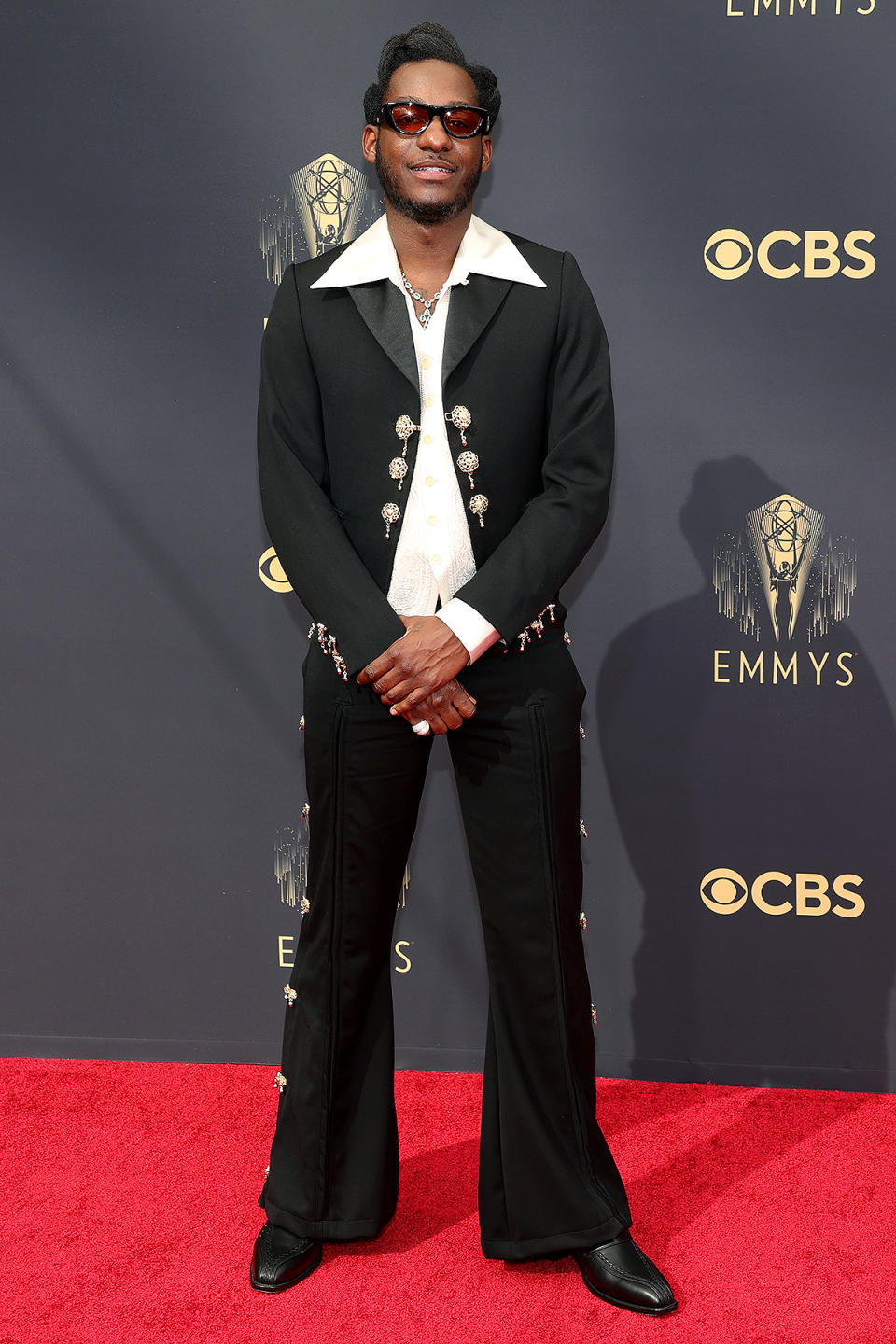 <p>Leon Bridges looked like a '70s dream in his black bell-bottom suit, complete with silver tassels and buttons. </p>