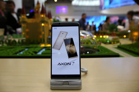FILE PHOTO: A ZTE Axon7 device is displayed at company's booth during Mobile World Congress in Barcelona, Spain, February 27, 2017. REUTERS/Paul Hanna/File Photo