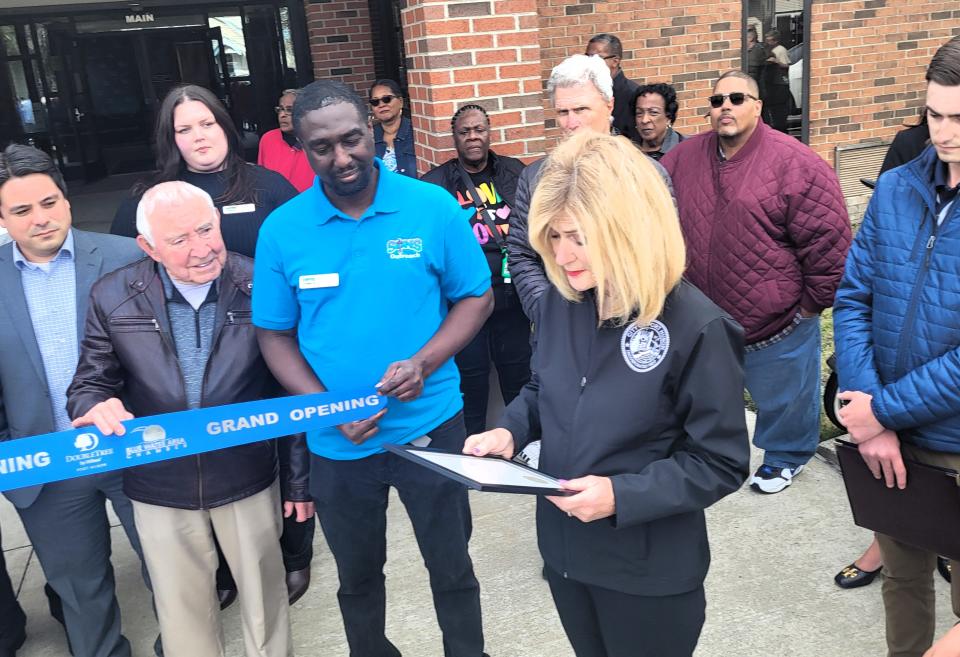 Mayor Pauline Repp reads from a certificate of recognition for SONS Outreach on Tuesday, April 16, 2024, during a celebration of the organization's new facility.