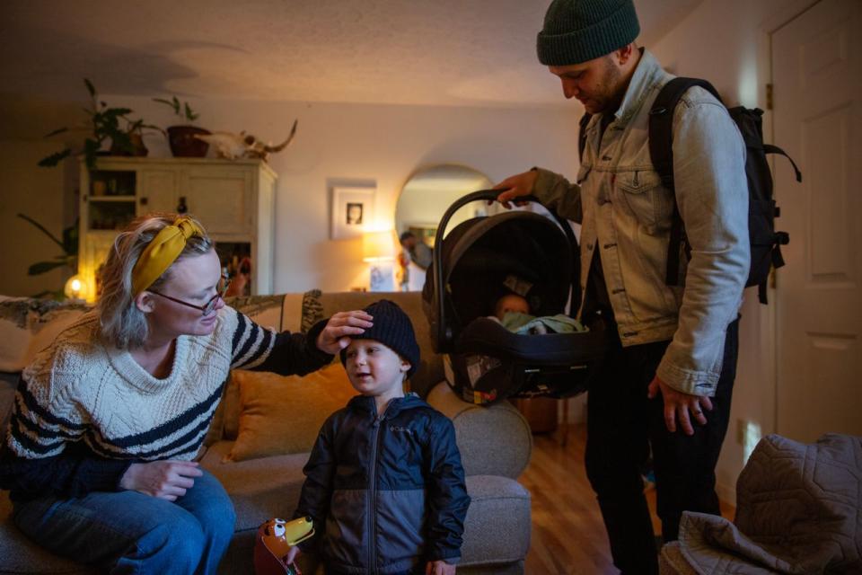 Gabrielle Rader says goodbye to her son Simon before he leaves for daycare with his sister Rhodes and father Zach Wiley.