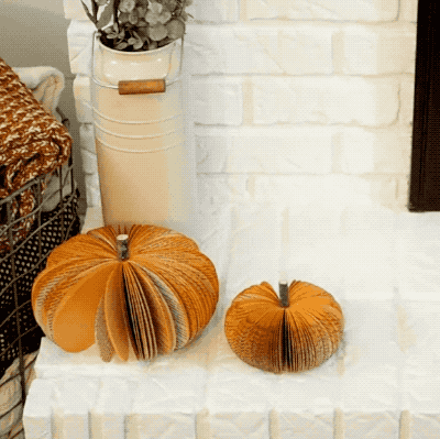 A set of pumpkins fashioned from books for avid readers who want fire-free decor that's still 