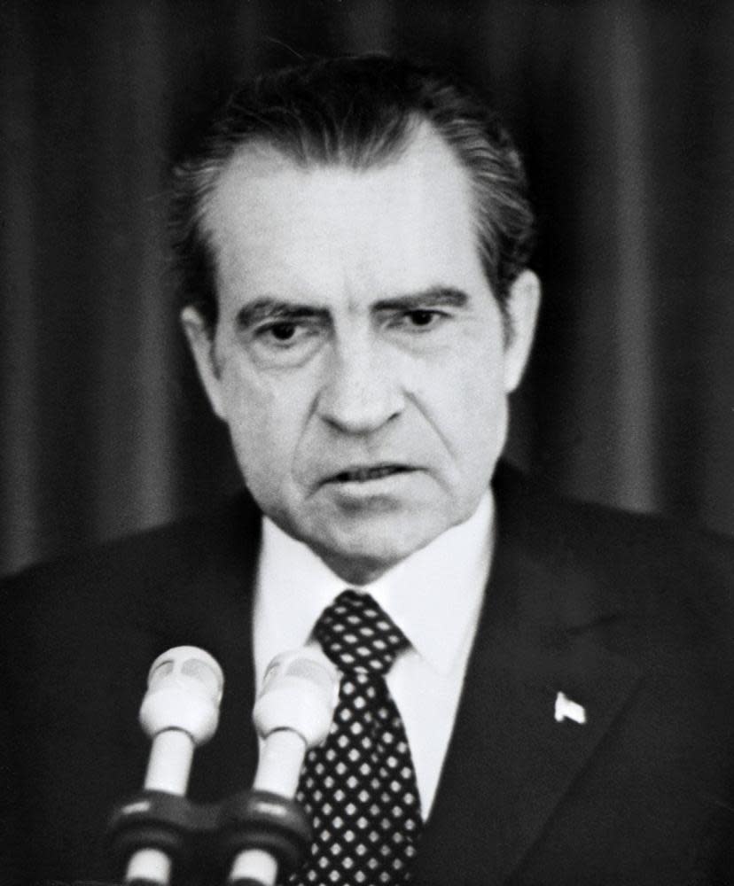 Nixon takes full responsibility for the Watergate scandal during a televised speech.