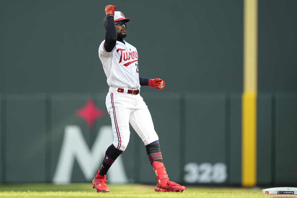 Minnesota Twins' Byron Buxton celebrates after hitting a single against the Houston Astros during the seventh inning of a baseball game Friday, April 7, 2023, in Minneapolis. (AP Photo/Abbie Parr)