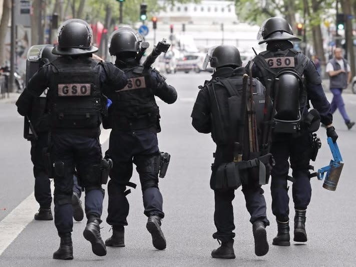 Special intervention French gendarmes and police arrive at the scene of an operation in Paris, France, May 26, 2016.  REUTERS/Benoit Tessier