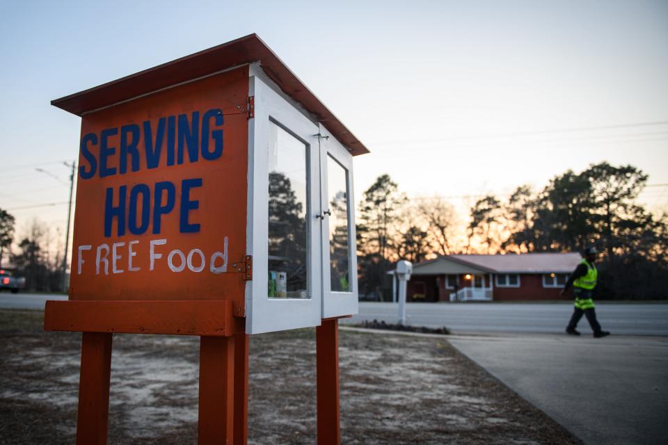 Trisha James, who runs the nonprofit Serving Hope, has a small food pantry in front of her home on Bingham Drive.